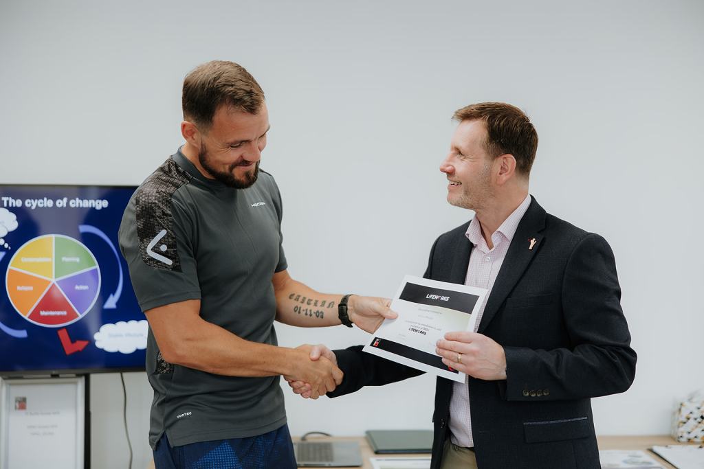 Veteran being presented Lifeworks certificate following completion of programme